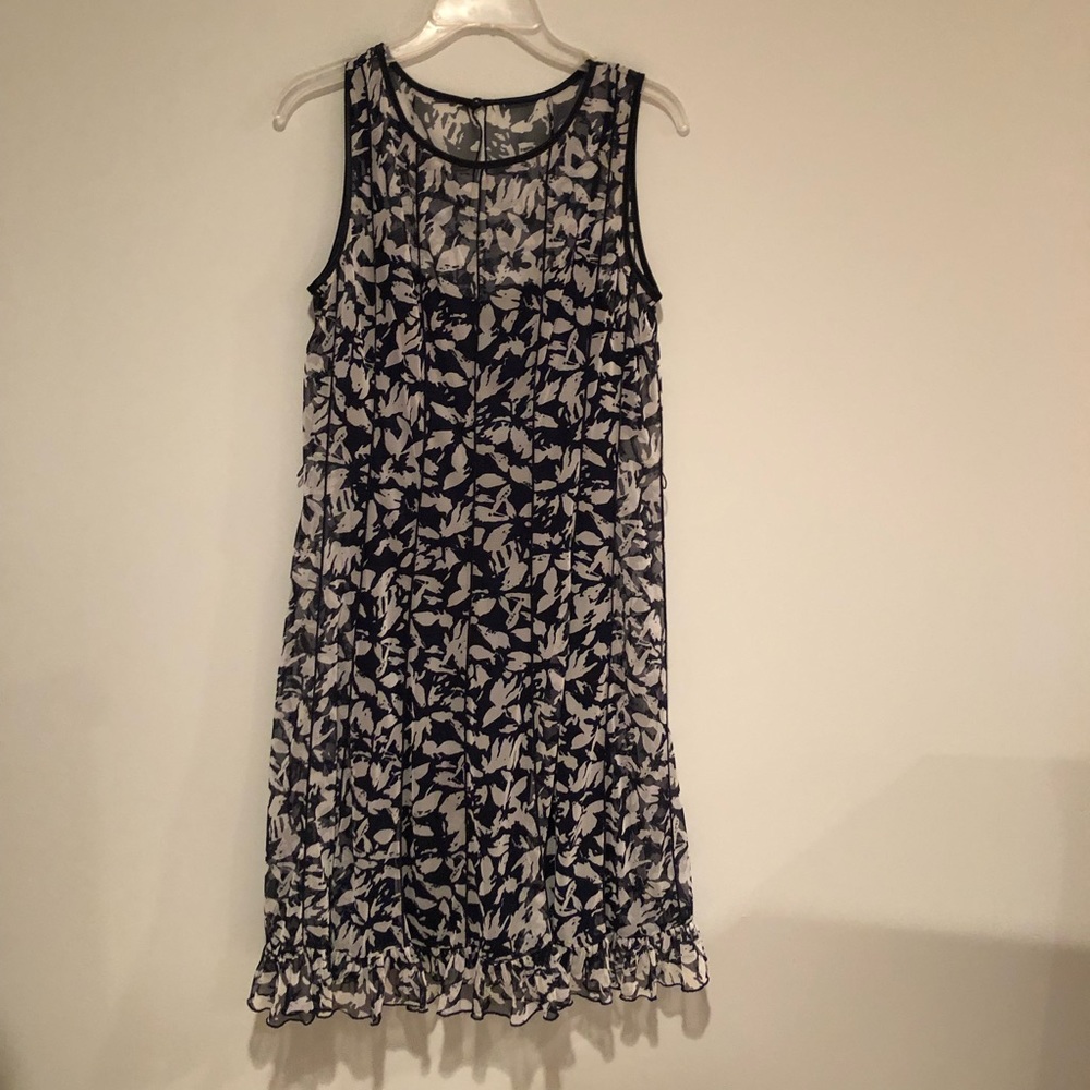 Navy blue and white sleeveless dress with ruffle at hemline, size 10